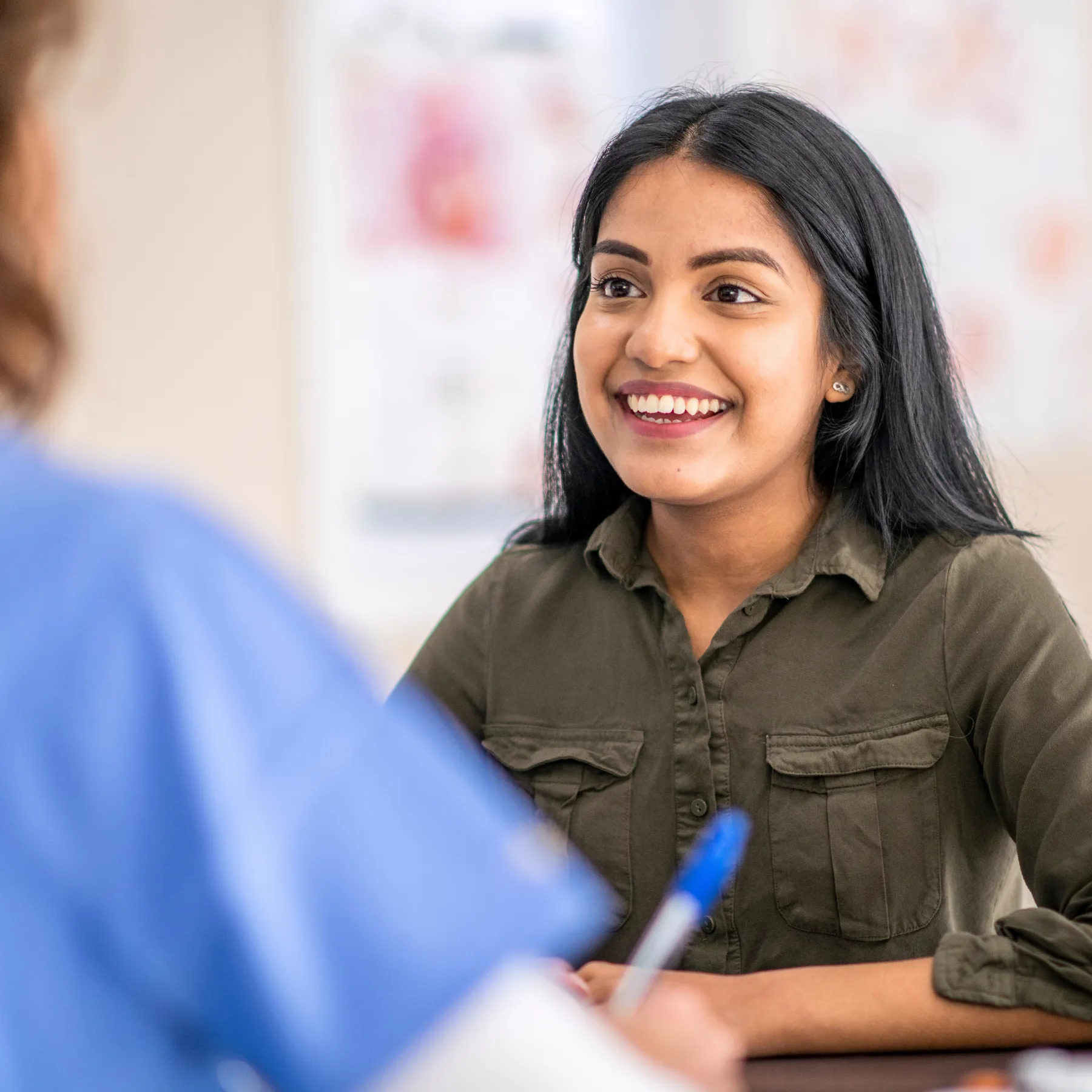 Doctor talking with a patient