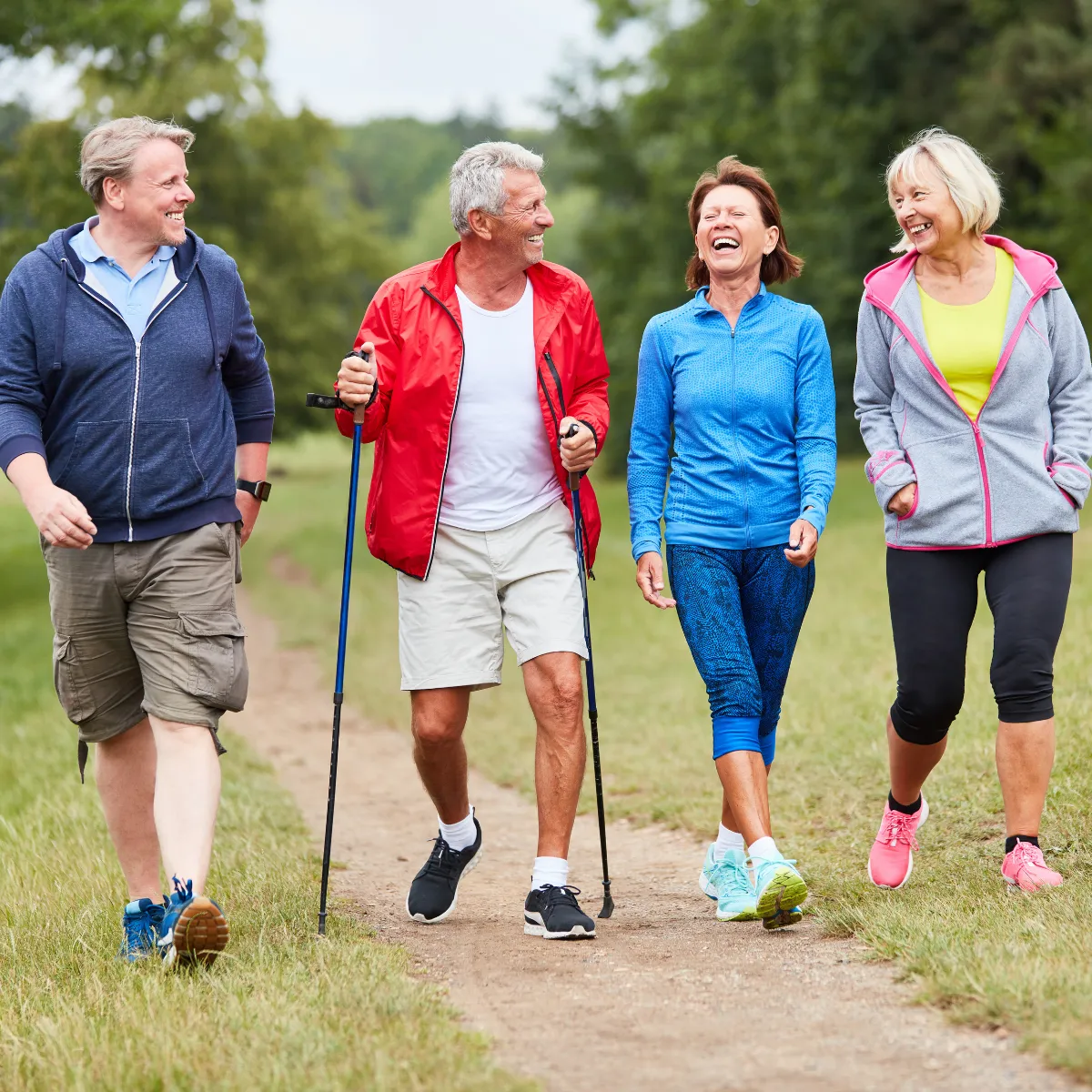 Elderly group walking on a path