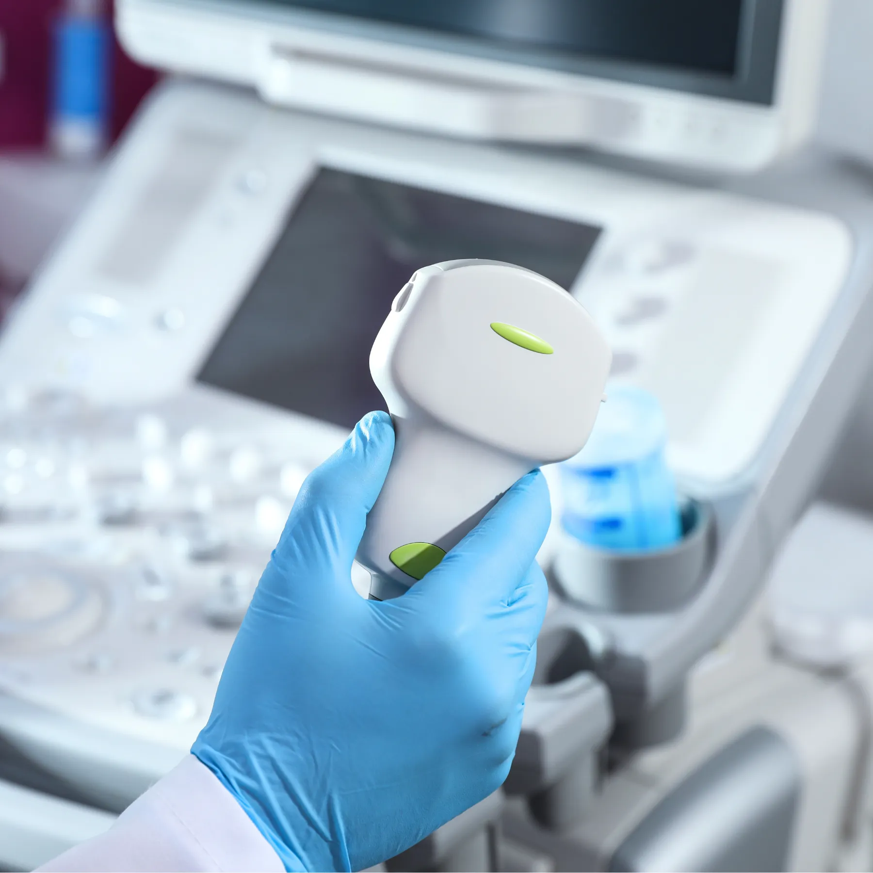 Doctor operating an ultrasound machine