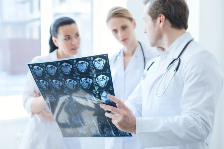 Doctors reviewing a medical document together